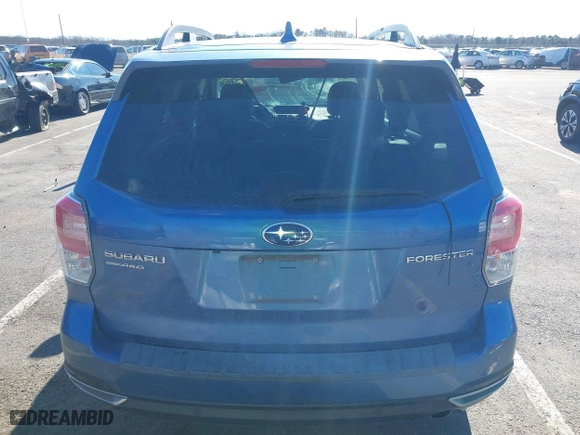 2018 Subaru Forester Touring with VIN JF2SJAWCXJH467976, listed as a IAAI auction lot 41744472 with 98,919 mi miles. Bid and sale history available at carsss.com. Image 16.
