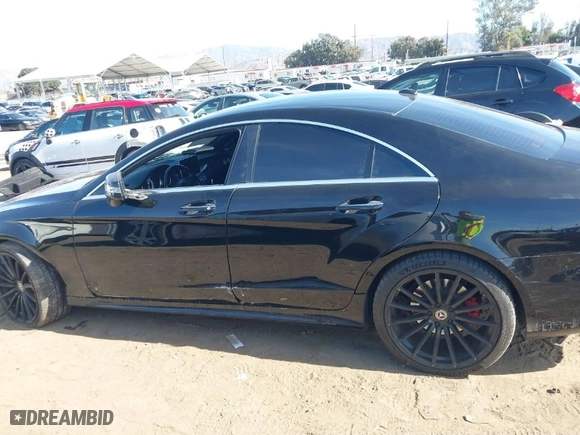2015 Mercedes-Benz CLS-Class CLS 550 with VIN WDDLJ7DB8FA140210, listed as a IAAI auction lot 41417964 with 106,721 mi miles. Bid and sale history available at carsss.com. Image 15.