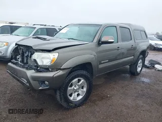 2014 Toyota Tacoma with VIN 5TFLU4EN6EX104410, listed as a IAAI auction lot 41925708 with 189,375 mi miles. Bid and sale history available at carsss.com. Image 2.