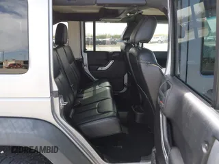 2015 Jeep Wrangler Unlimited Rubicon Hard Rock с VIN 1C4HJWFG6FL762537, выставлен на аукционе IAAI как лот 41792066 с пробегом 125 829 миль миль и . История ставок и продаж доступна на DreamBid. Изображение 8.