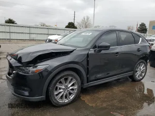 2019 Mazda CX-5 Grand Touring with VIN JM3KFBDM2K0650314, listed as a Copart auction lot 51606755 with 88,630 mi miles and Salvage Title. Bid and sale history available at carsss.com. Image 1.
