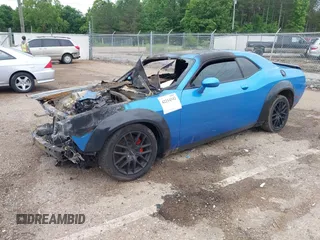 2016 Dodge Challenger R/T Plus with VIN 2C3CDZBT0GH184881, listed as a IAAI auction lot 42214342 with Not provided miles and . Bid and sale history available at DreamBid. Image 2.