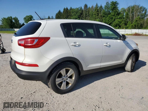 2012 Kia Sportage LX with VIN KNDPBCA21C7233424, listed as a Copart auction lot 61829465 with 129,526 mi miles and Salvage title. Bid and sale history available at DreamBid. Image 3.