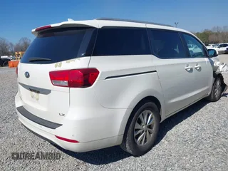 2016 Kia Sedona LX with VIN KNDMB5C10G6183002, listed as a IAAI auction lot 41629853 with 129,322 mi miles. Bid and sale history available at carsss.com. Image 4.