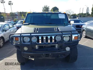 2003 Hummer H2 z VIN 5GRGN23UX3H124727, wystawiony jako IAAI lot #41697787 z przebiegiem 241 554 mil mil oraz . Historia ofert i sprzedaży dostępna na DreamBid. Obrazek 12.
