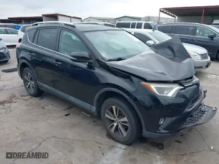 2016 Toyota RAV4 XLE with VIN 2T3WFREV9GW276278, listed as a IAAI auction lot 41906293 with 112,000 mi miles. Bid and sale history available at carsss.com. Image 1.
