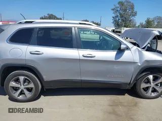 2021 Jeep Cherokee Limited with VIN 1C4PJLDX0MD100067, listed as a IAAI auction lot 42273029 with 84,579 mi miles and . Bid and sale history available at DreamBid. Image 14.