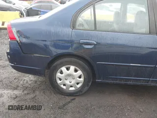 2003 Honda Civic LX with VIN 2HGES165X3H564619, listed as a IAAI auction lot 42017947 with 125,518 mi miles. Bid and sale history available at carsss.com. Image 12.