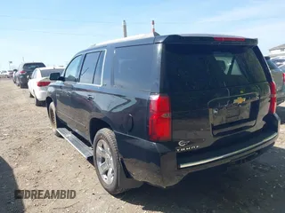 2015 Chevrolet Tahoe LTZ z VIN 1GNSKCKC8FR141163, wystawiony jako IAAI lot #42114008 z przebiegiem 221 804 mil mil oraz . Historia ofert i sprzedaży dostępna na DreamBid. Obrazek 3.