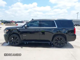 2015 Chevrolet Tahoe with VIN 1GNSK2KC4FR610534, listed as a IAAI auction lot 42357319 with 140,479 mi miles and . Bid and sale history available at DreamBid. Image 14.