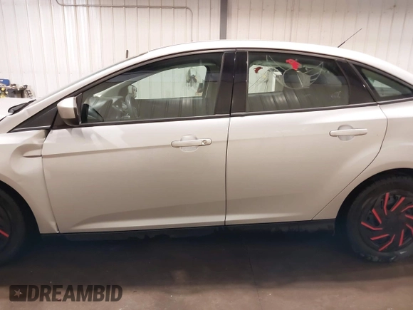 2012 Ford Focus SE with VIN 1FAHP3F21CL284921, listed as a IAAI auction lot 42054351 with 164,377 mi miles and . Bid and sale history available at carsss.com. Image 14.