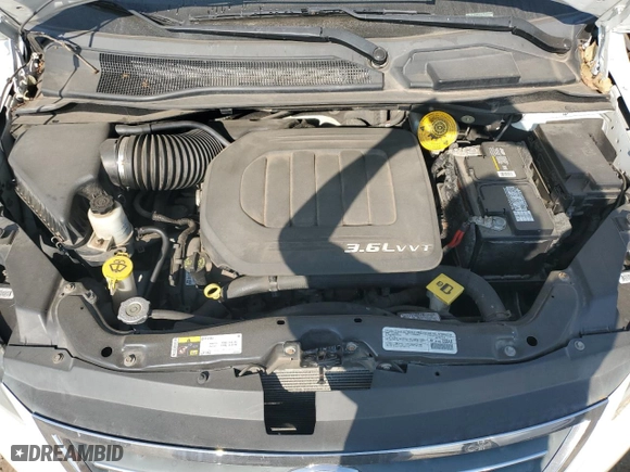 2014 Volkswagen Routan SE w/RSE & Navigation with VIN 2C4RVABG7ER135241, listed as a Copart auction lot 71055144 with 186,341 mi miles and Salvage Title. Bid and sale history available at carsss.com. Image 12.