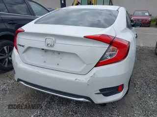 2020 Honda Civic LX with VIN 2HGFC2F64LH593100, listed as a IAAI auction lot 41877572 with 76,713 mi miles and . Bid and sale history available at DreamBid. Image 16.