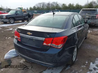 2014 Chevrolet Cruze 1LT with VIN 1G1PC5SB5E7229007, listed as a IAAI auction lot 41544780 with 98,075 mi miles and . Bid and sale history available at DreamBid. Image 4.