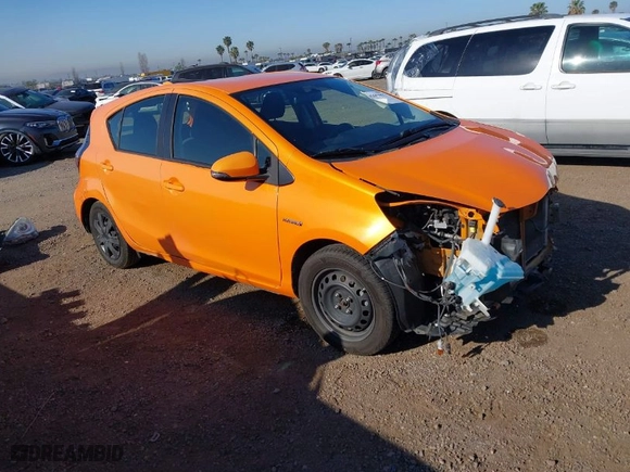 2015 Toyota Prius c One with VIN JTDKDTB36F1092272, listed as a IAAI auction lot 42001027 with 154,157 mi miles. Bid and sale history available at carsss.com. Image 1.