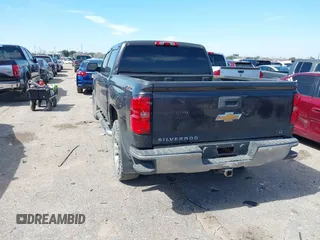 2015 Chevrolet Silverado 1500 LT with VIN 3GCUKREC2FG232302, listed as a IAAI auction lot 41652224 with 231,334 mi miles. Bid and sale history available at carsss.com. Image 3.
