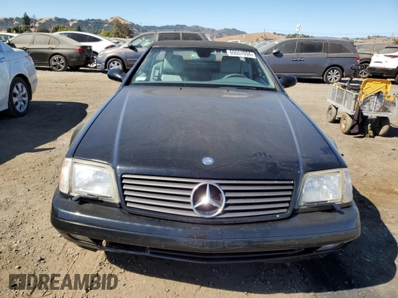 1999 Mercedes-Benz SL-Class with VIN WDBFA68F8XF186072, listed as a Copart auction lot 69557094 with 99,691 mi miles and Salvage Title. Bid and sale history available at carsss.com. Image 5.