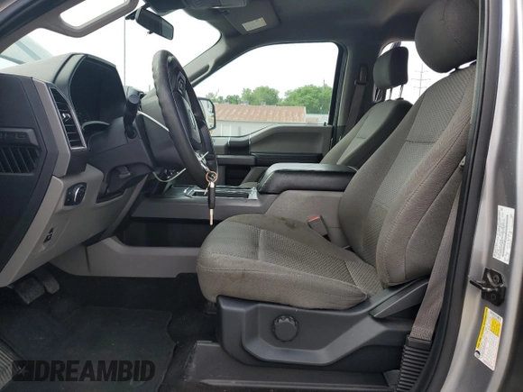 2020 Ford F-150 XL with VIN 1FTEW1EB6LFA98814, listed as a Copart auction lot 60810255 with 137,672 mi miles and Salvage title. Bid and sale history available at DreamBid. Image 7.