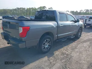 2021 Nissan Titan Pro-4X with VIN 1N6AA1ED0MN518084, listed as a IAAI auction lot 42147230 with 41,496 mi miles and . Bid and sale history available at DreamBid. Image 4.
