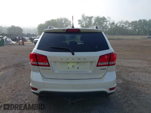 2013 Dodge Journey Crew with VIN 3C4PDCDG0DT591533, listed as a IAAI auction lot 42630548 with 164,961 mi miles and . Bid and sale history available at DreamBid. Image 16.