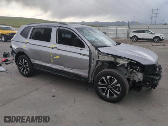 2023 Volkswagen Tiguan S with VIN 3VVFB7AXXPM103928, listed as a Copart auction lot 57119895 with 13,820 mi miles and Salvage title. Bid and sale history available at DreamBid. Image 4.