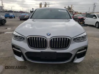 2020 BMW X4 M40i z VIN 5UX2V5C02L9B14571, wystawiony jako Copart lot #44318703 z przebiegiem 14 861 mil mil oraz . Historia ofert i sprzedaży dostępna na DreamBid. Obrazek 5.