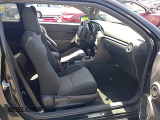 2014 Scion tC with VIN JTKJF5C71E3072199, listed as a IAAI auction lot 41956178 with 154,730 mi miles. Bid and sale history available at carsss.com. Image 5.