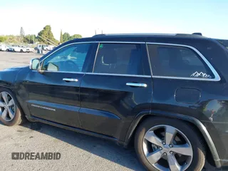 2014 Jeep Grand Cherokee Overland with VIN 1C4RJFCT5EC221015, listed as a IAAI auction lot 41959844 with 78,367 mi miles and . Bid and sale history available at DreamBid. Image 15.