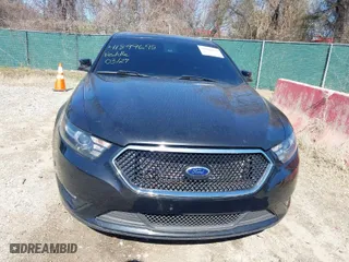 2014 Ford Taurus SHO with VIN 1FAHP2KT0EG164404, listed as a IAAI auction lot 41899695 with 157,077 mi miles. Bid and sale history available at carsss.com. Image 13.