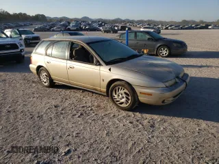 1998 Saturn SW z VIN 1G8ZK8279WZ246084, wystawiony jako Copart lot #77267514 z przebiegiem 143 224 mil mil oraz Tytuł czysty. Historia ofert i sprzedaży dostępna na DreamBid. Obrazek 4.