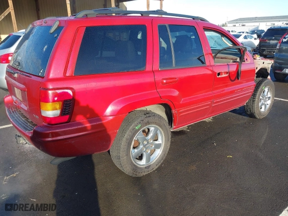 2004 Jeep Grand Cherokee Limited with VIN 1J8GW58N64C329504, listed as a IAAI auction lot 41785215 with 124,952 mi miles. Bid and sale history available at carsss.com. Image 4.