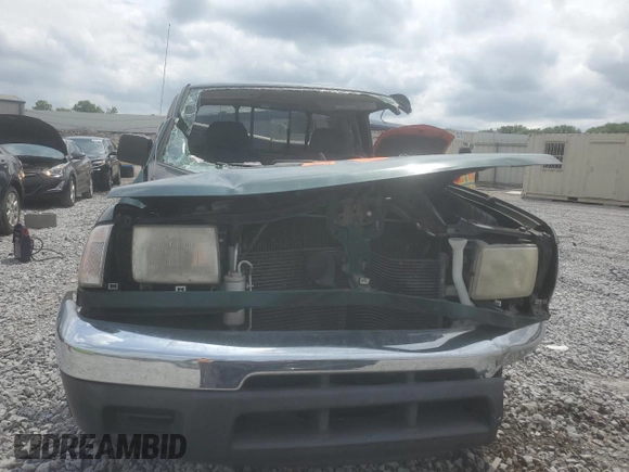 2000 Nissan Frontier XE with VIN 1N6DD26S0YC411769, listed as a Copart auction lot 60044125 with Not provided miles and Salvage title. Bid and sale history available at DreamBid. Image 5.