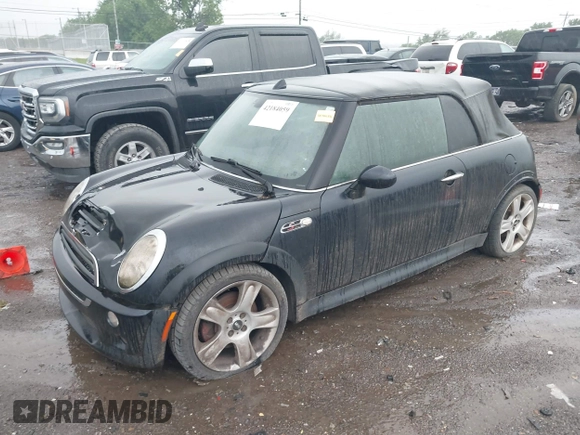2006 MINI Convertible S with VIN WMWRH33516TF86823, listed as a IAAI auction lot 42184059 with Not Provided miles and . Bid and sale history available at DreamBid. Image 2.