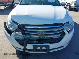2015 Ford Taurus SEL with VIN 1FAHP2E8XFG182899, listed as a IAAI auction lot 41209454 with 93,477 mi miles and . Bid and sale history available at carsss.com. Image 6.