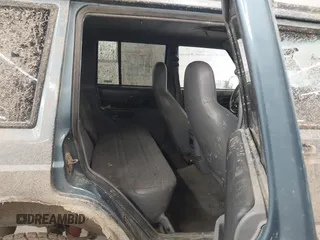 1998 Jeep Cherokee Sport with VIN 1J4FJ68S5WL284937, listed as a IAAI auction lot 41984490 with 259,716 mi miles and . Bid and sale history available at DreamBid. Image 8.