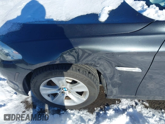 2013 BMW 5 Series 528i xDrive with VIN WBAXH5C55DDW12945, listed as a IAAI auction lot 41343124 with 137,672 mi miles and . Bid and sale history available at carsss.com. Image 6.