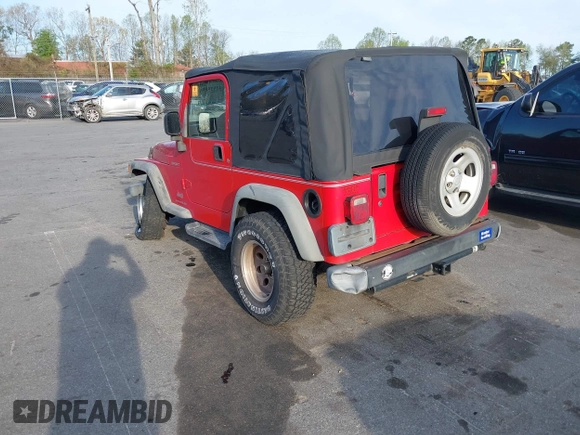 2003 Jeep Wrangler Sport with VIN 1J4FA49S13P320159, listed as a IAAI auction lot 41935699 with 212,355 mi miles. Bid and sale history available at carsss.com. Image 3.