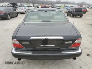 1999 Jaguar XJ z VIN SAJKD6043XC872105, wystawiony jako Copart lot #86270724 z przebiegiem Nie podano mil oraz Szkoda całkowita • Salvage title. Historia ofert i sprzedaży dostępna na DreamBid. Obrazek 6.