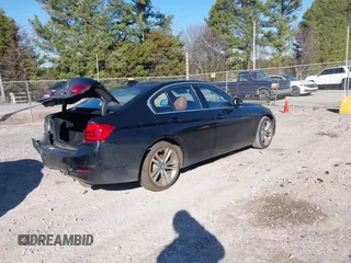 2017 BMW 3 Series 330i with VIN WBA8B9C58HK675536, listed as a IAAI auction lot 41665254 with 122,098 mi miles. Bid and sale history available at carsss.com. Image 4.