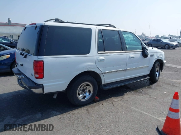 1998 Ford Expedition XLT with VIN 1FMRU176XWLA59524, listed as a IAAI auction lot 39809480 with 225,650 mi miles. Bid and sale history available at carsss.com. Image 4.