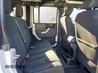 2016 Jeep Wrangler Unlimited Sahara z VIN 1C4HJWEG6GL218719, wystawiony jako Copart lot #56065235 z przebiegiem 96 061 mil mil oraz Szkoda całkowita • Salvage title. Historia ofert i sprzedaży dostępna na DreamBid. Obrazek 11.