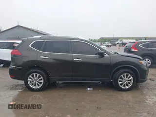 2017 Nissan Rogue SV with VIN KNMAT2MV1HP601384, listed as a IAAI auction lot 42454707 with 159,501 mi miles and . Bid and sale history available at DreamBid. Image 13.