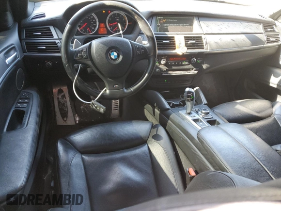 2014 BMW X6 M with VIN 5YMGZ0C50E0C40694, listed as a Copart auction lot 43943305 with 124,104 mi miles and Salvage Title. Bid and sale history available at carsss.com. Image 8.