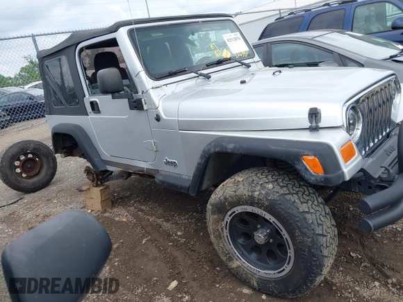 2004 Jeep Wrangler Sport with VIN 1J4FA49S44P772575, listed as a IAAI auction lot 42512876 with 226,387 mi miles and . Bid and sale history available at DreamBid. Image 14.