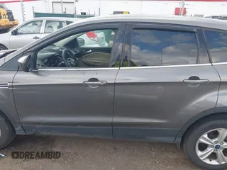2013 Ford Escape SE with VIN 1FMCU9G95DUC01185, listed as a IAAI auction lot 42602840 with 140,697 mi miles and . Bid and sale history available at DreamBid. Image 14.