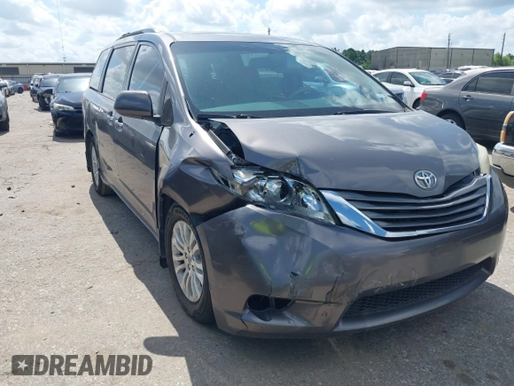 2014 Toyota Sienna XLE with VIN 5TDYK3DC0ES513076, listed as a IAAI auction lot 42724629 with 154,019 mi miles and . Bid and sale history available at DreamBid. Image 1.