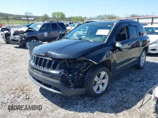 2014 Jeep Compass Sport with VIN 1C4NJCBA0ED510942, listed as a IAAI auction lot 41952596 with 196,030 mi miles and . Bid and sale history available at DreamBid. Image 2.