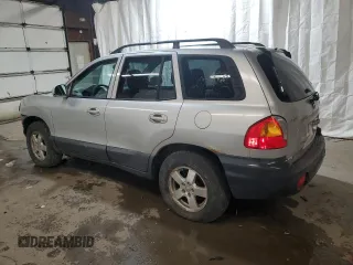 2004 Hyundai Santa Fe GLS with VIN KM8SC73D74U681615, listed as a Copart auction lot 76599554 with 163,530 mi miles and Salvage Title. Bid and sale history available at carsss.com. Image 2.
