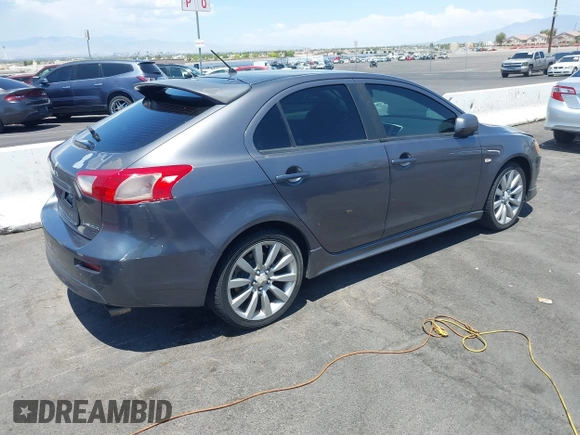 2010 Mitsubishi Lancer GTS z VIN JA32X8HW6AU005689, wystawiony jako IAAI lot #42467923 z przebiegiem 166 508 mil mil oraz . Historia ofert i sprzedaży dostępna na DreamBid. Obrazek 4.