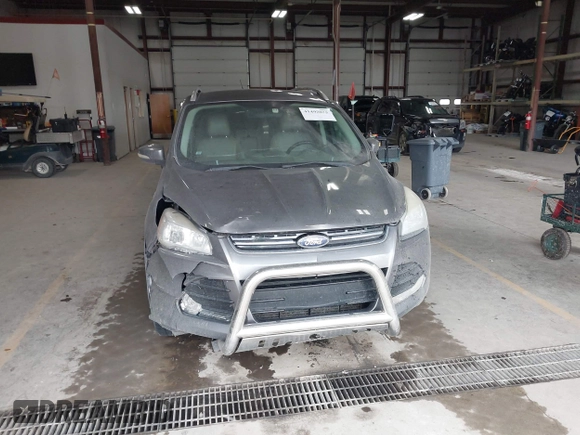 2014 Ford Escape Titanium with VIN 1FMCU9J90EUC31625, listed as a IAAI auction lot 41492075 with 301,917 mi miles and . Bid and sale history available at DreamBid. Image 12.
